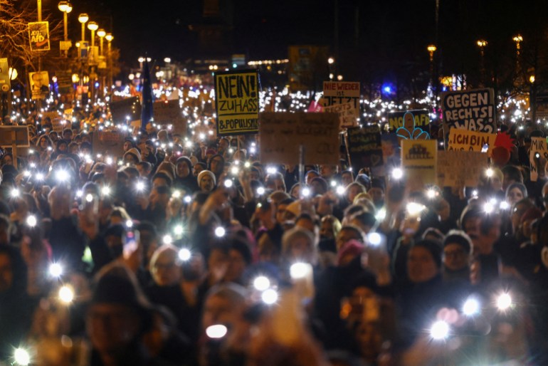 Germans protest at conservative cooperation with far right on migration