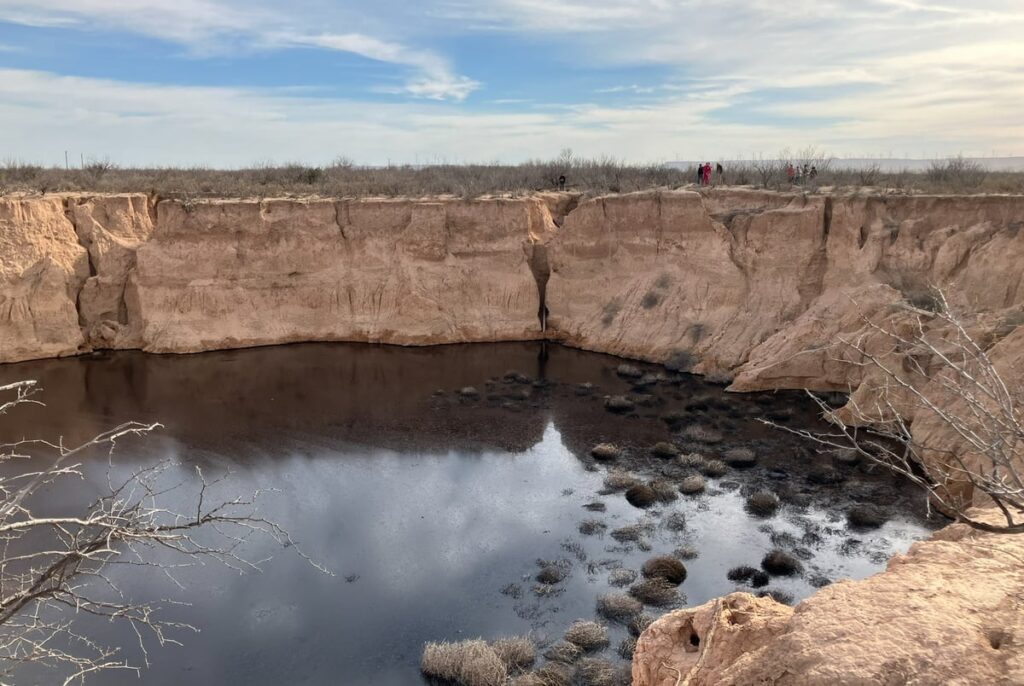 An abandoned West Texas oil well has created a 200-foot-wide sinkhole